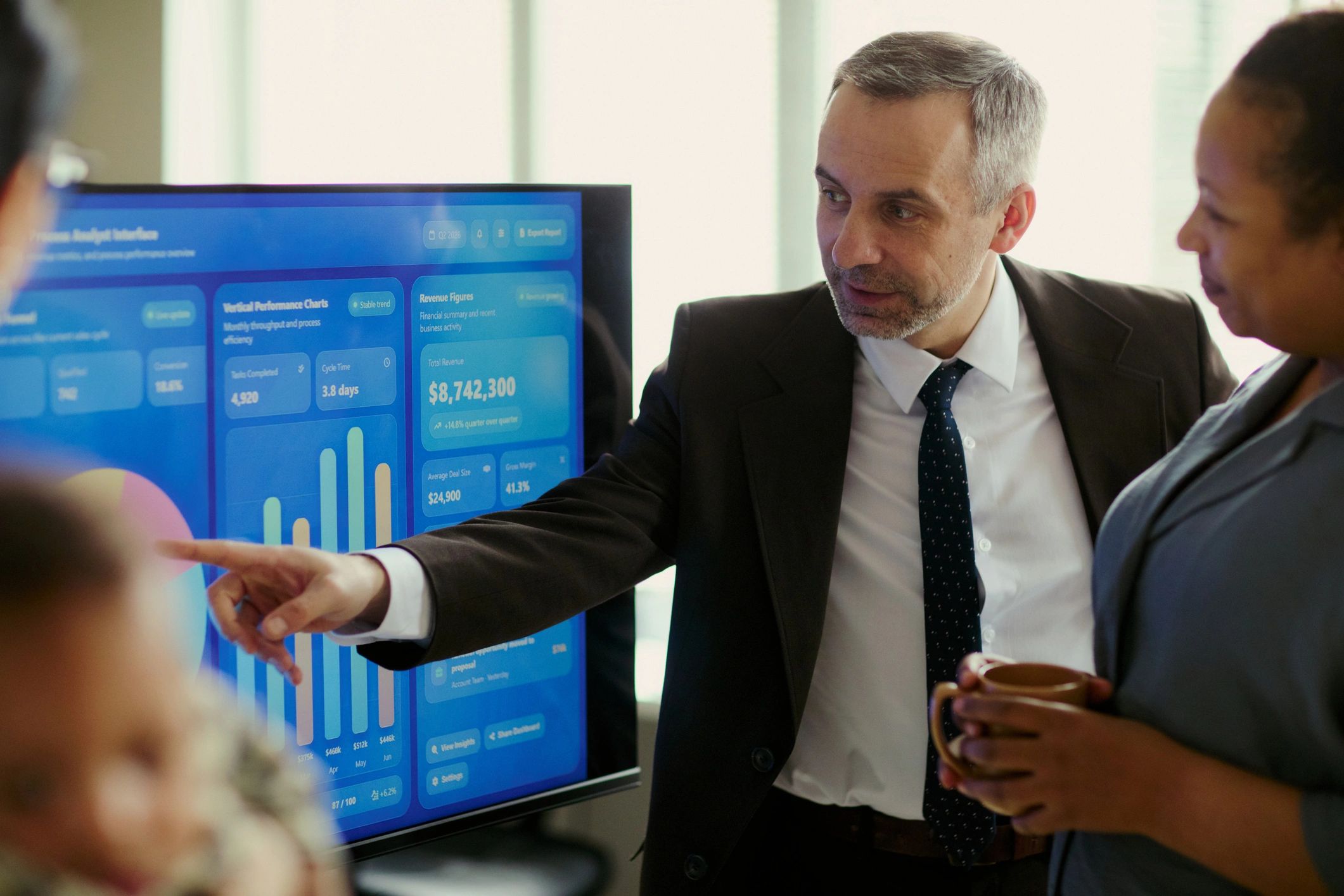Business leader presenting analytics and strategy to a team